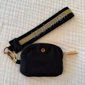 Lululemon Black Mini Pouch with Black & Gold Logo Wrist Strap